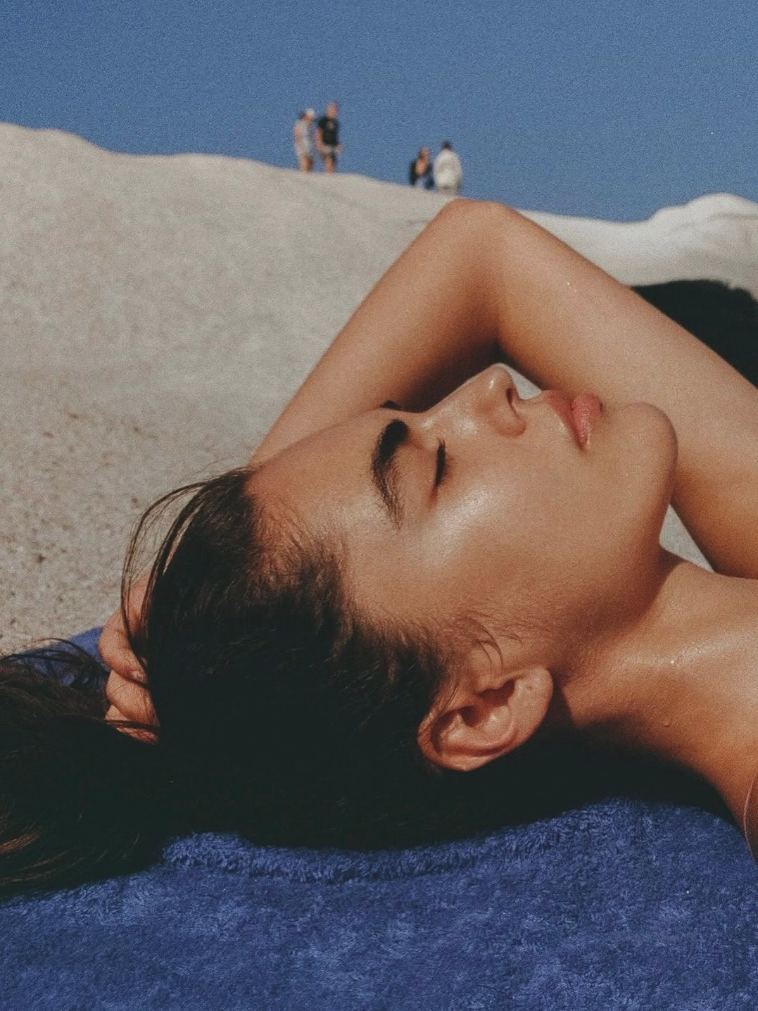 woman tanning in the sun female fertility hormones