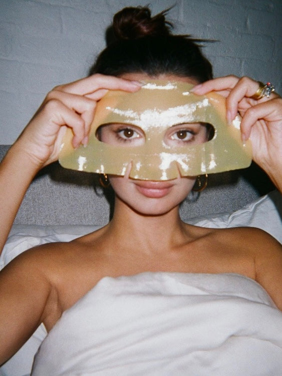 Flat lay of foods commonly perceived as healthy including protein powder oat milk and peanut butter representing underrated dietary triggers for skin congestion and breakouts.